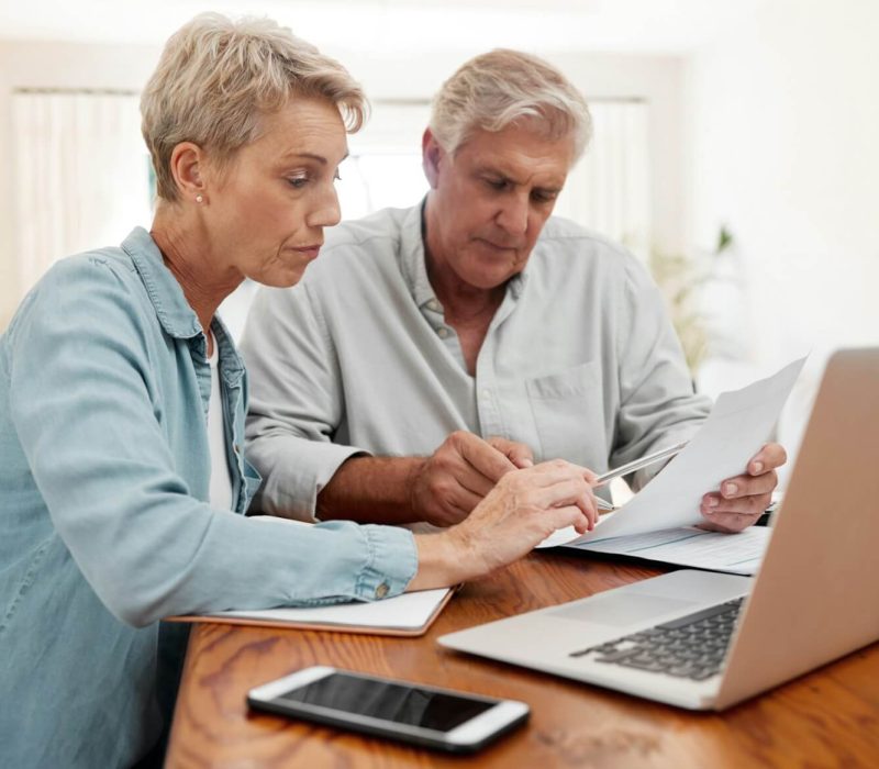 communication-discussion-and-couple-with-paperwork-planning-financial-strategy-budget-plan-senior.jpg